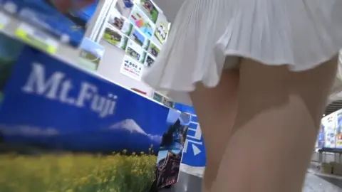 Blonde Asian Girl in Store