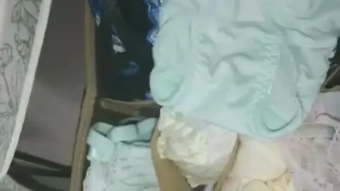 Baby Clothes in Drawers
