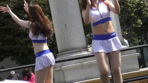 Asian Girls Dancing in White Outfits