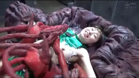 Asian Girl in Green Dress Restrained by Tentacles