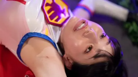 Asian Women in Fetish Costumes and Bondage