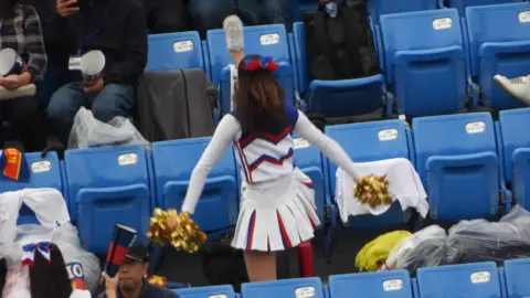 Asian Cheerleader in Uniform