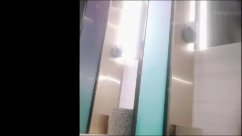 Naked Woman Touching Body in Front of Mirror