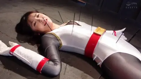 Asian Girl in Industrial Setting