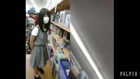 Asian Teen in Store
