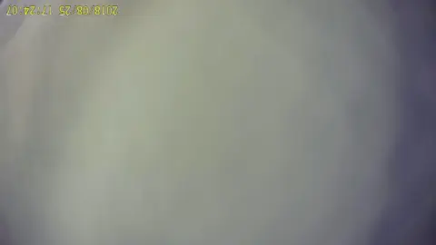 Asian Teen Sits with Legs Apart in Dressing Room