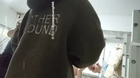 Asian Teen Undresses in Locker Room