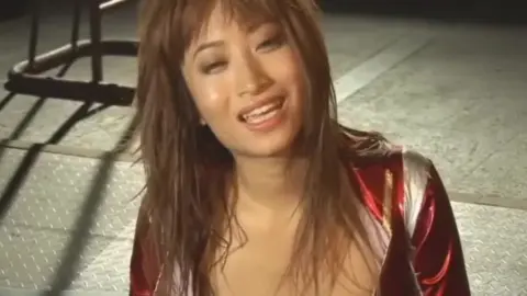 Asian Teen with Long Brown Hair Smiling
