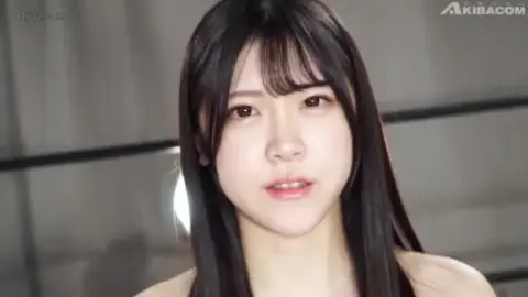 Asian Women Wrestling in Swimsuits