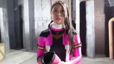 Asian Woman in Pink Costume