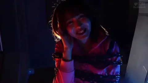 Asian Cosplay Duo in Superhero Costumes