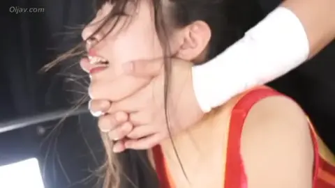 Asian Women Wrestling in Ring
