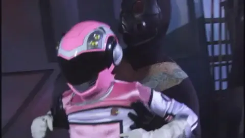 Futuristic Asian Duo in Sci-Fi Setting