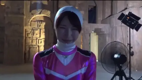 Asian Superheroine in Pink Costume