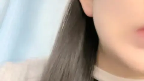 Asian Teen with Smooth Skin and Long Dark Hair