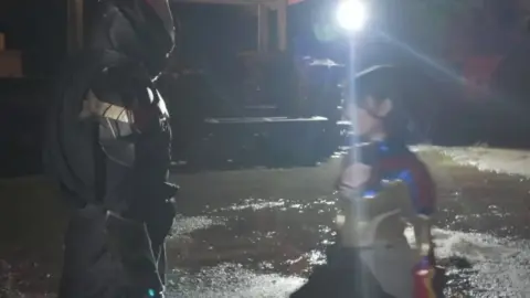 Asian Cosplay Trio in Action Scene