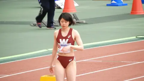Asian Athletes in Steamy Track and Field Session