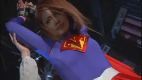 Asian Performers in Superman Costume and Lab Coats