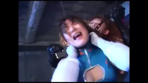 Brunettes Wrestling in Blue Ring