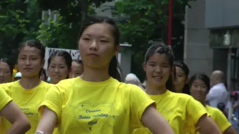 Asian Teens Dancing on Street