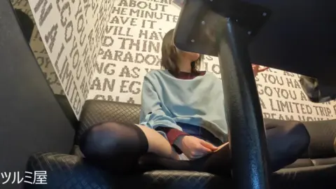 Asian Girl in Stockings and Skirt