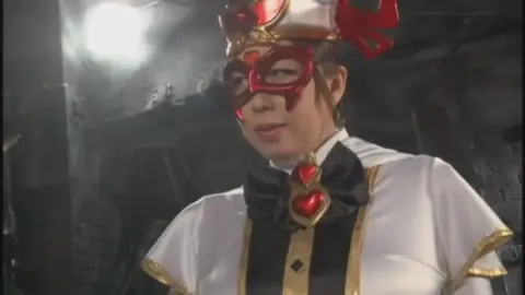 Asian Duo in Red Masks and Costumes