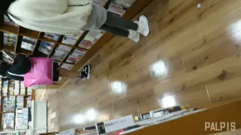 Asian Schoolgirls in Bookstore