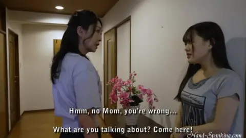 Asian Lesbians Spanking in Bedroom