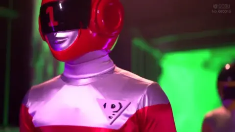 Asian Couple in Red Costumes Engage in Intimate Acts