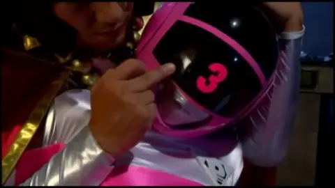 Asian Couple in Pink and Silver Costumes