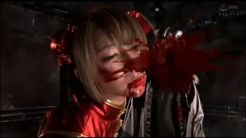 Asian Blonde Bombshell in Red Dress