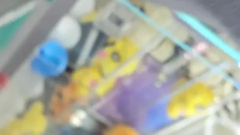 Asian Teen Plays with Claw Machine before Masturbation