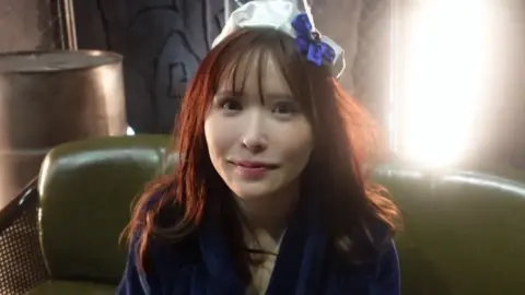 Asian Schoolgirl in Sailor Fuku Outdoors