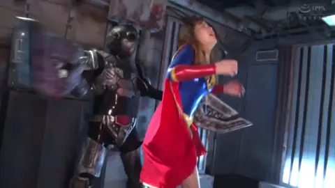 Bound and Subdued Woman in Red Boots