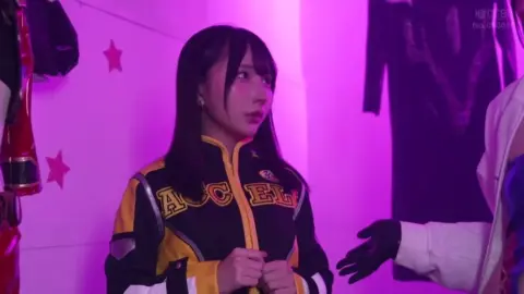 Asian Performers in Erotic Costume Scenes