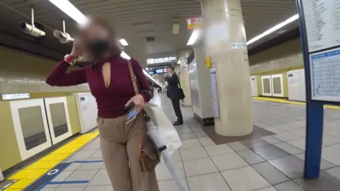 Asian Brunette in Mask Subway Encounter