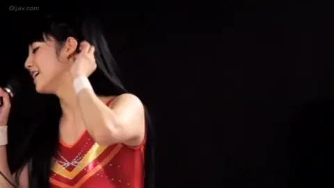 Asian Performers in Revealing Outfits Posing