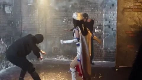 Asian Girl in Red Glasses and White Outfit