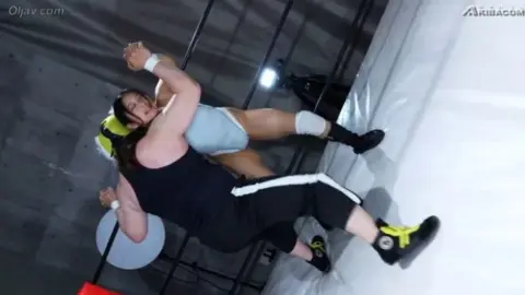 Asian Wrestlers in Action – Kicking and Wrestling Hold