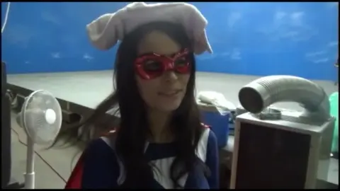 Asian Women in Futuristic Costumes