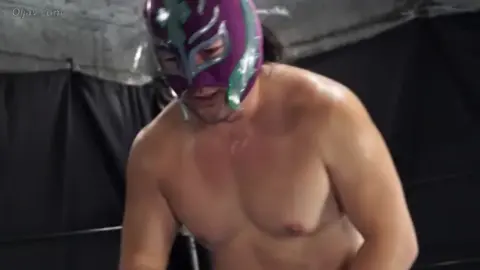 Wrestling Match with Masked Opponent