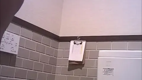 Asian Girls Urinating in Bathroom