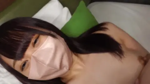 Asian Couple Intimate Bedroom Encounter