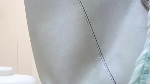 Asian Girl in Bathroom