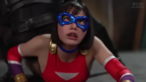 Bent Over and Held from Behind