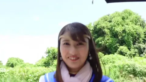 Asian Brunette in Sailor Costume