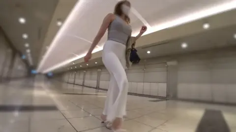 Asian Girl in Gray Tank Top and White Pants