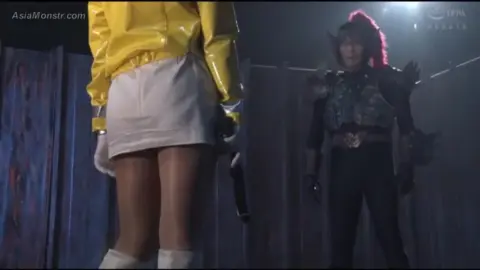 Asian Couple Intimate Moments on Concrete Floor