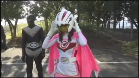 Asian Cosplay Duo in Erotic Embrace