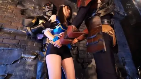 Asian Girl in Blue and Gold Costume